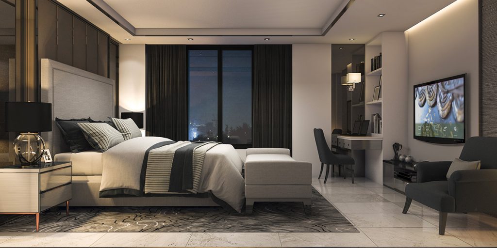 smart hotel room with tv screen on